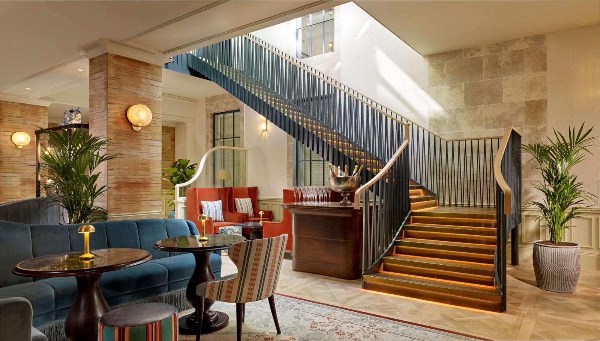 100 Queen'S Gate Hotel London, Curio Collection By Hilton Экстерьер фото The staircase at the hotel